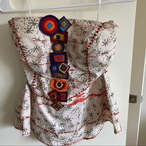 Fun and funky strapless top.